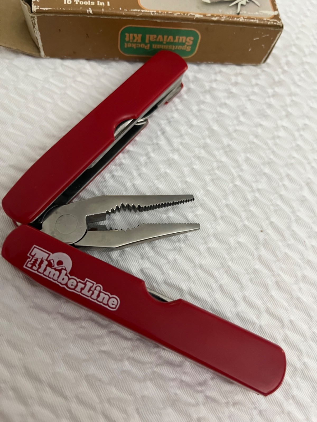 vintage Timberline Sportsman Pocket Survival Kit multi-tool in red