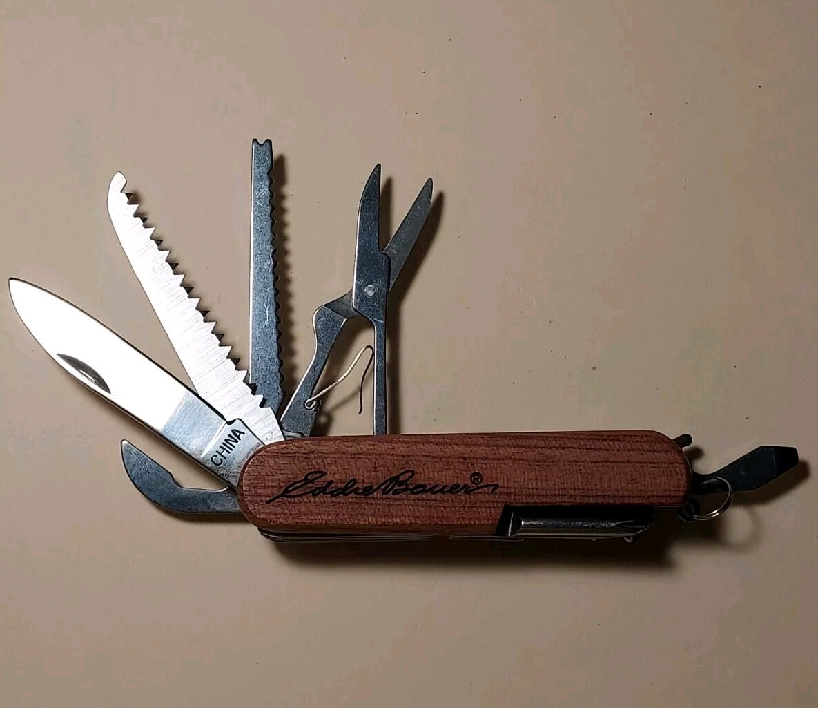 Eddie Bauer advertising Wood Handle Multi Tool *scissors needs repair*