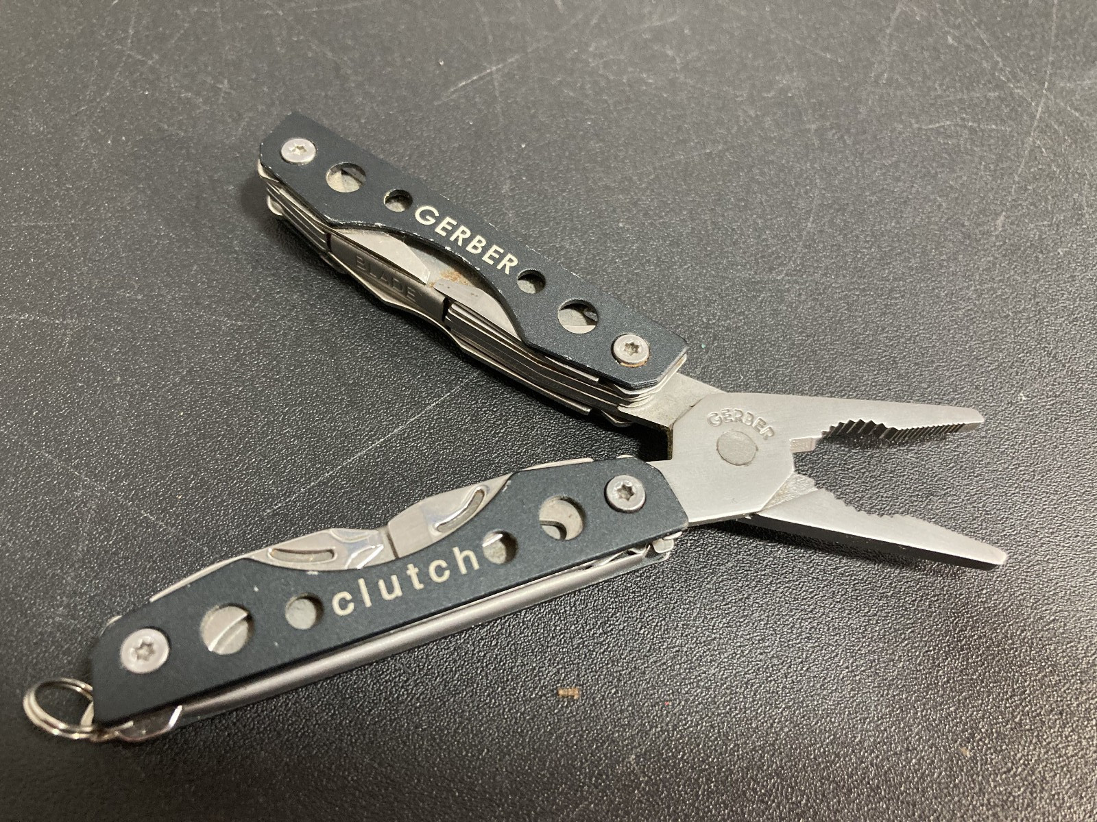 Gerber Clutch Mini Multitool Keychain Pliers Blade Tweezers file screwdrivers