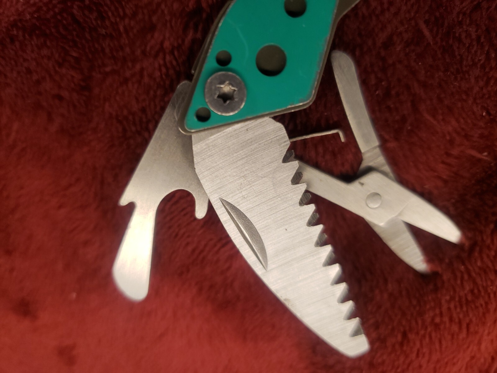 Lot of three Cabela’s Multi Tool Stainless Clear, Teal Green & Red