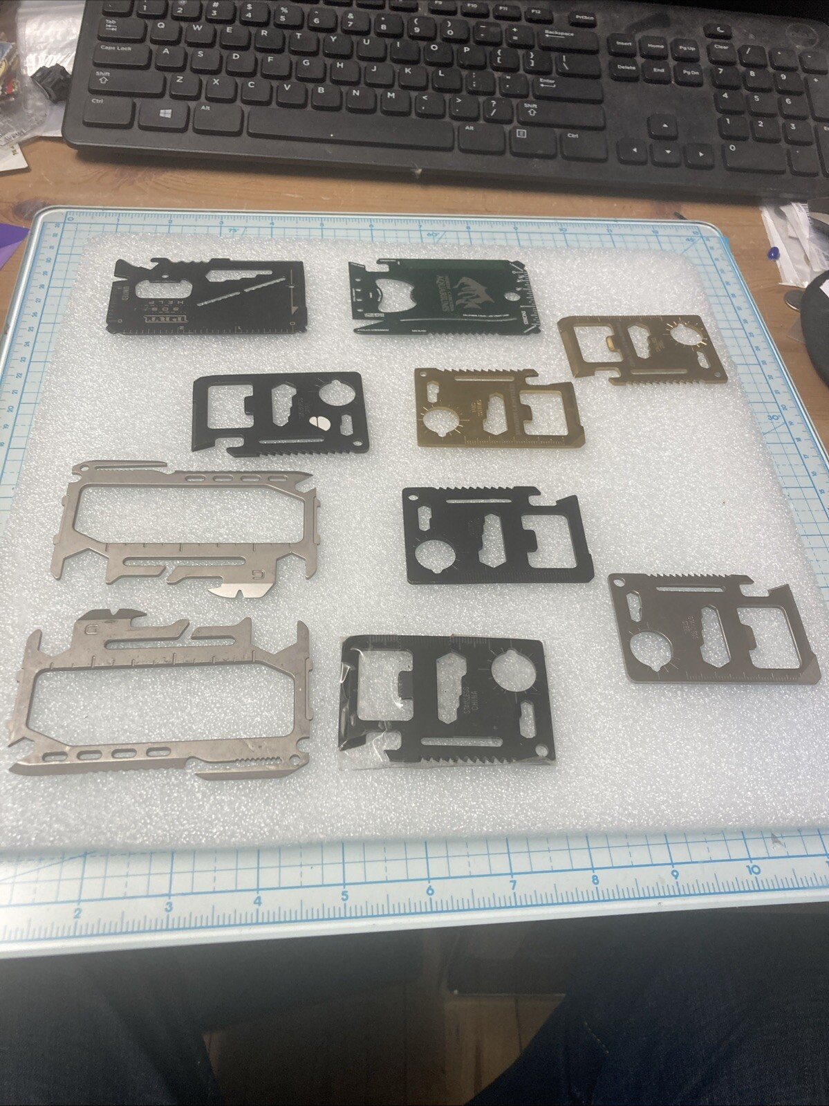 10 USED Various/Multicolor TSA Confiscated Metal Survival Wallet Cards. A STEEL!