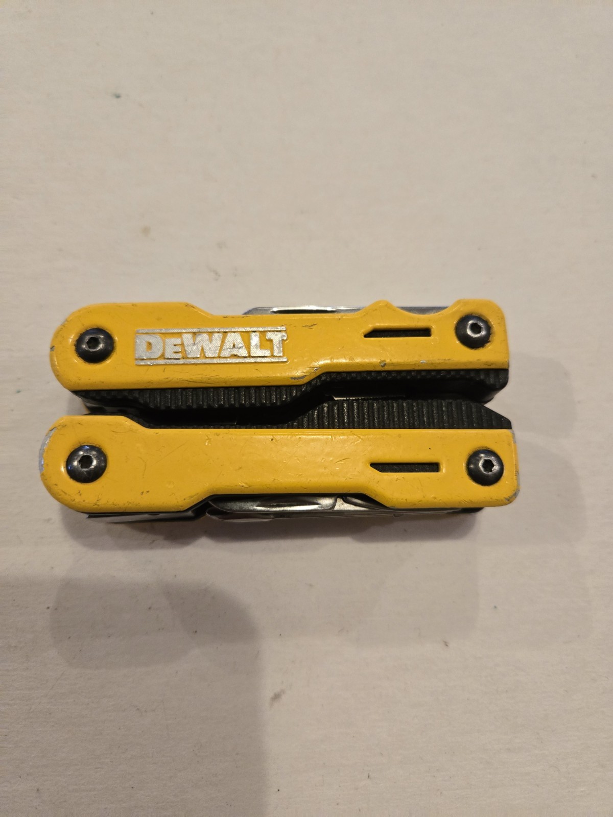 DeWalt 16-in-1 Multi-Tool W/Pliers/Knife/Screwdrivers/Openers/Liner Lock Blade
