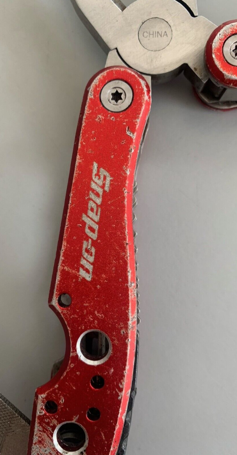 Snap-On Stainless Steel Red Easy Grip Folding Handles 9-in-1 Multi-Tool pliers