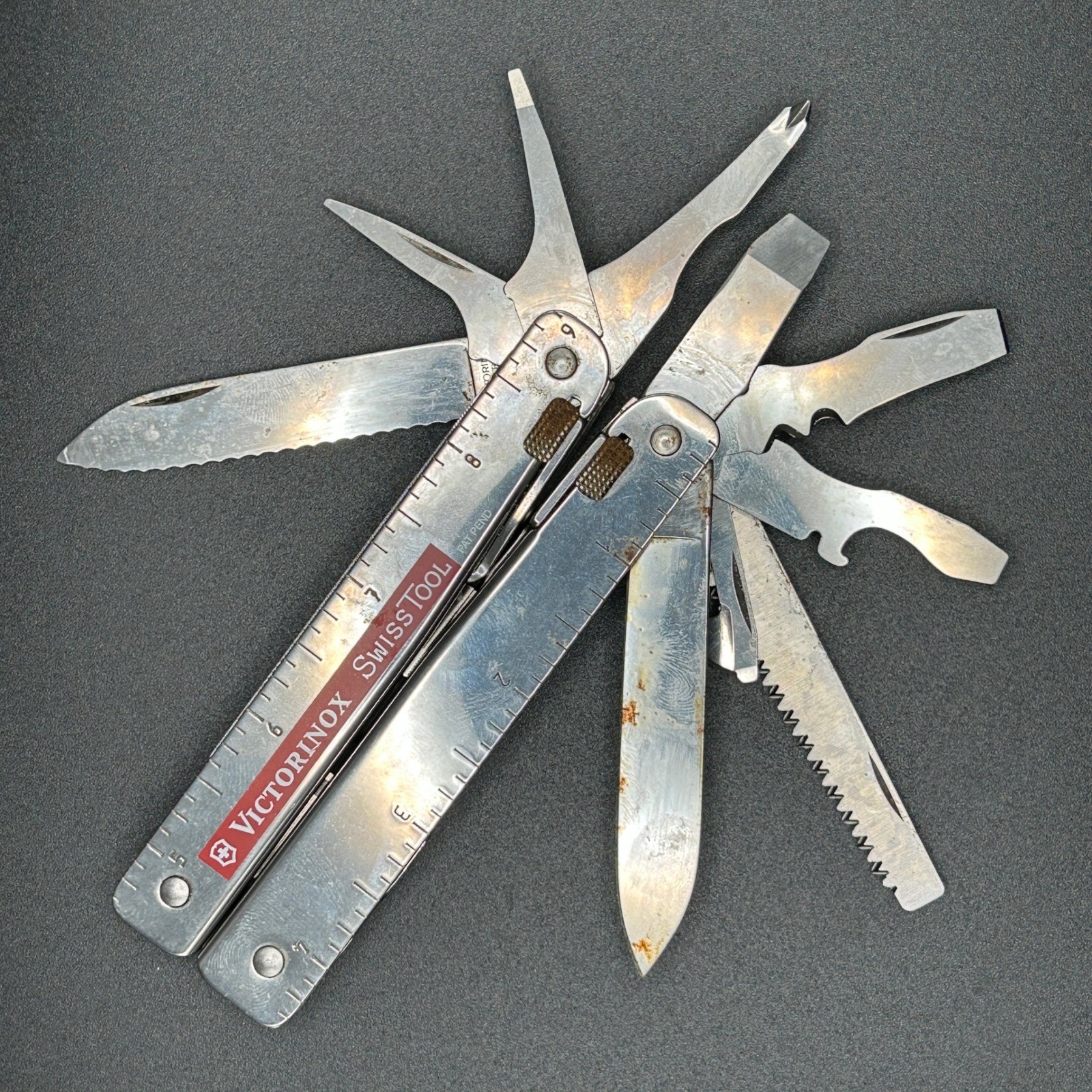 VTG Victorinox SwissTool Multi-Tool Stainless Steel W/Black Pouch Swiss Made