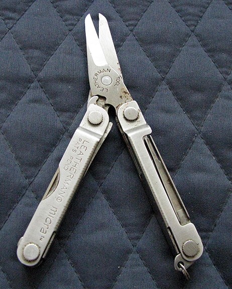 Letherman Multi mini Tool with case.