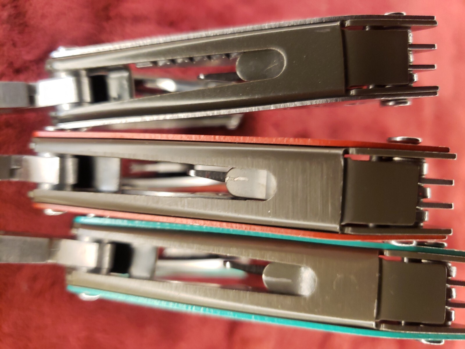 Lot of three Cabela’s Multi Tool Stainless Clear, Teal Green & Red