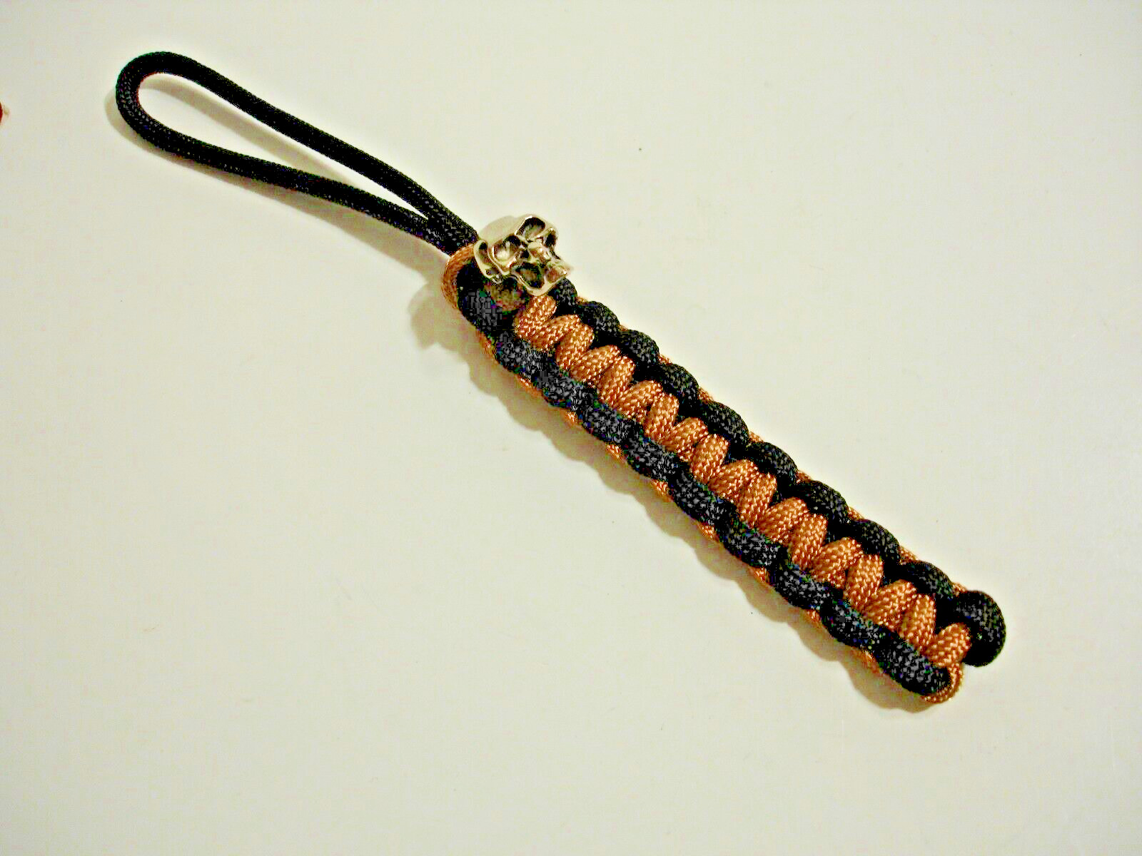 BLACK & GOLD 550 PARACORD HANDMADE KNIFE LANYARD + METAL SKULL BEAD MADE IN USA