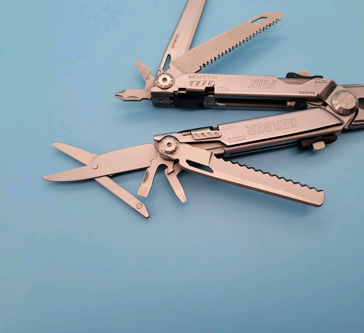 GERBER Flik Multi-Tool – Silver – Pliers, Knife, Scissors, Saw – DISCONTINUED