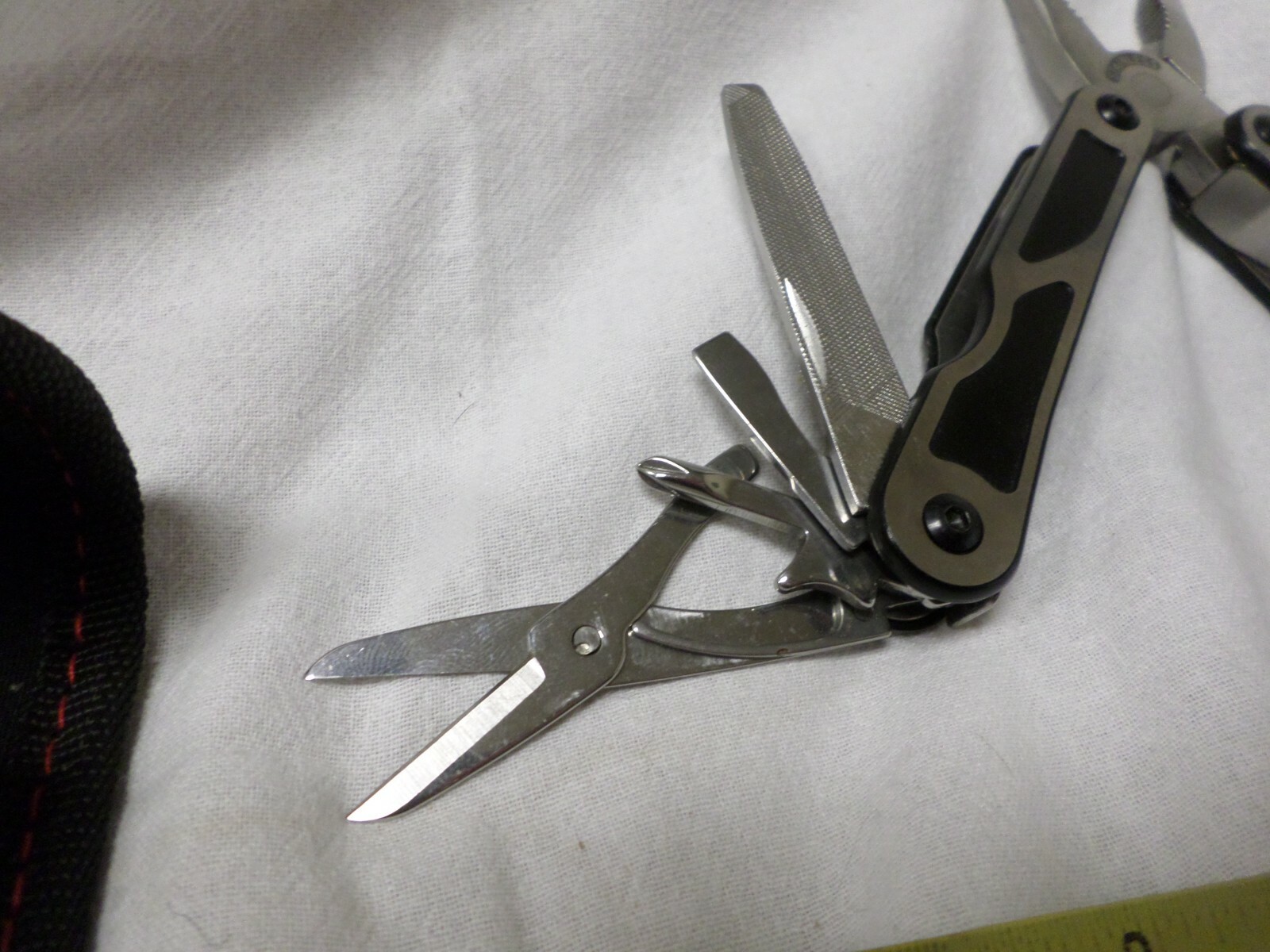 WorkPro Quick Draw Multi Tool Black and Silver Handle With Case