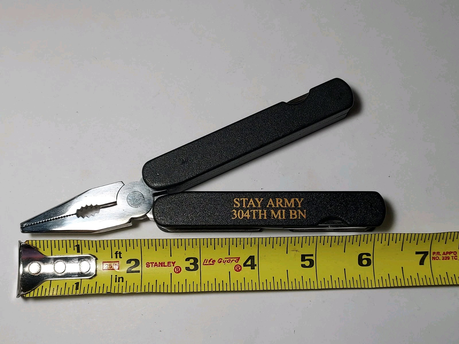 Black Multi Tool printed STAY ARMY 304TH MI BN – Pliers, Blade