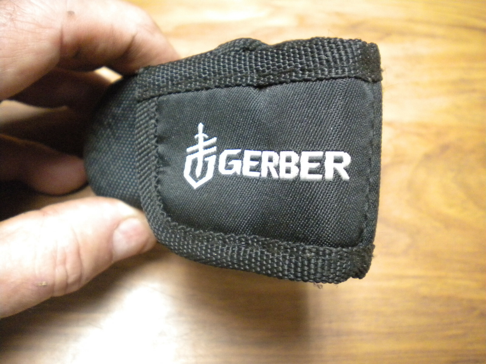 Gerber Suspension Multi-Tool with black nylon belt sheath in used excellent con