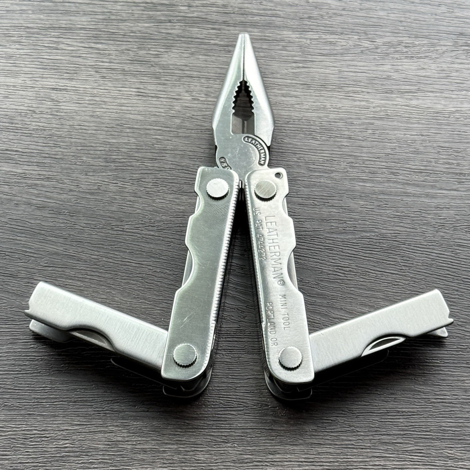 Leatherman MINI TOOL multitool. Variant w/US PAT 4744272 on Both Sides. Engraved