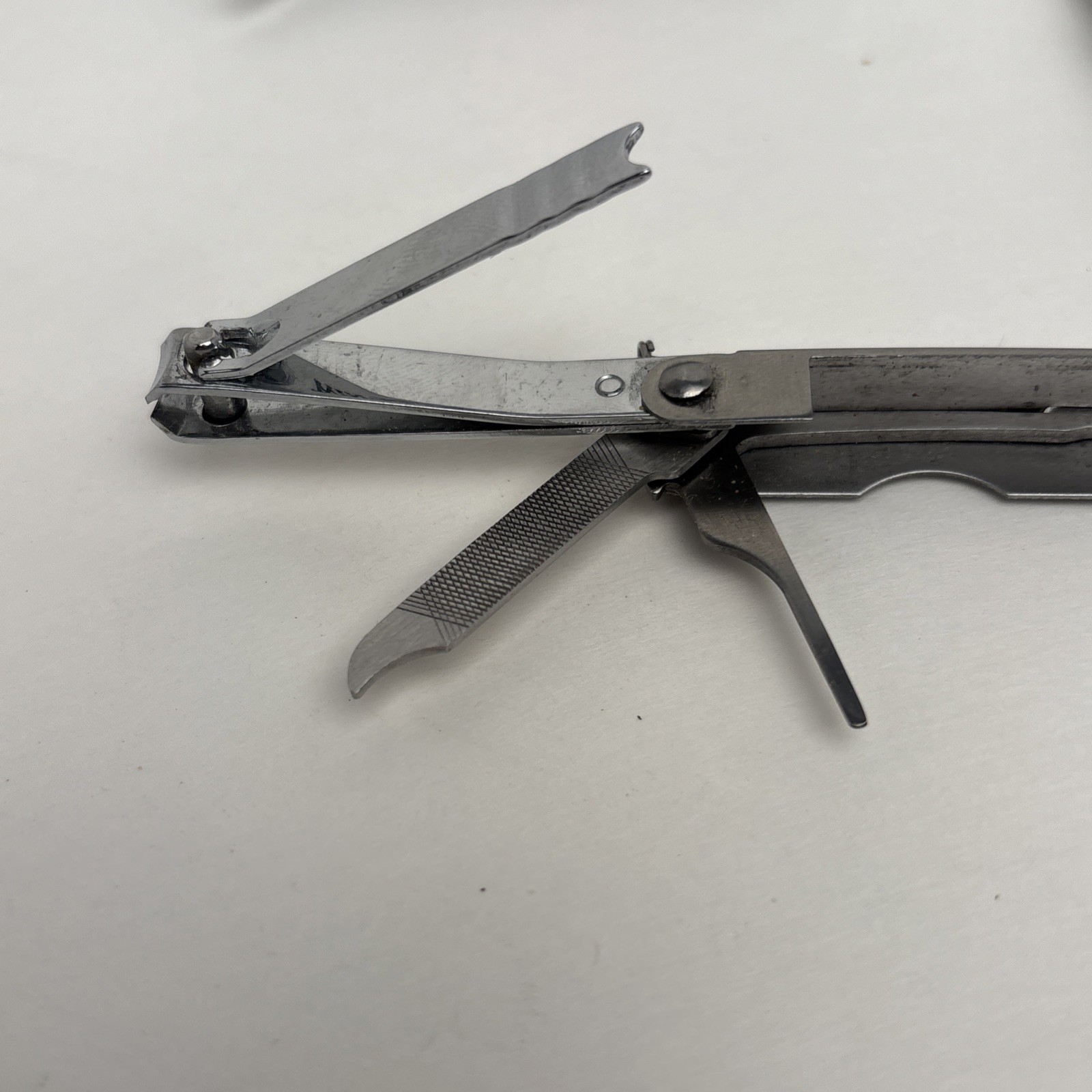 Lot Of 4 Different Function Multi-Tools Winchester Nail Clipper & Wood Grain