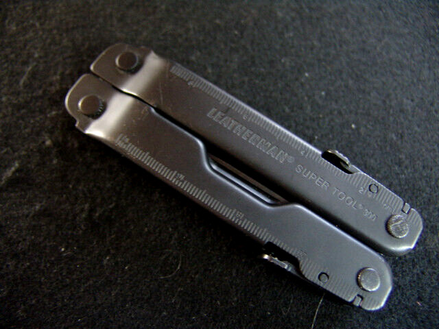LEATHERMAN SUPERTOOL 300- BLACK OXIDE-MULTI TOOL-w/LEATHERMAN MOLLE CASE-NR MINT