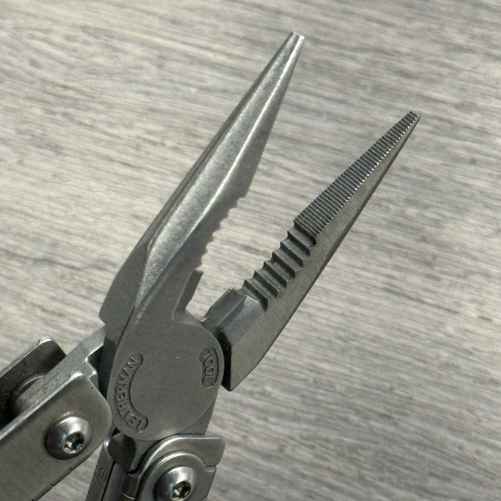 Leatherman Sideclip multitool. Lightly used. Late Run: shiny factory polished