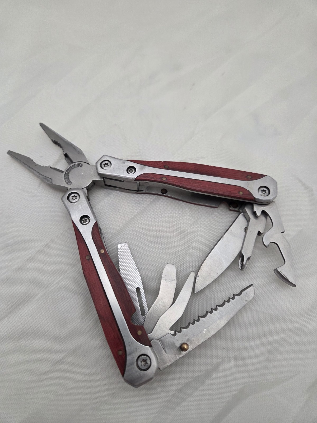 Stainless Steel Leatherman type multi tool with wood trim