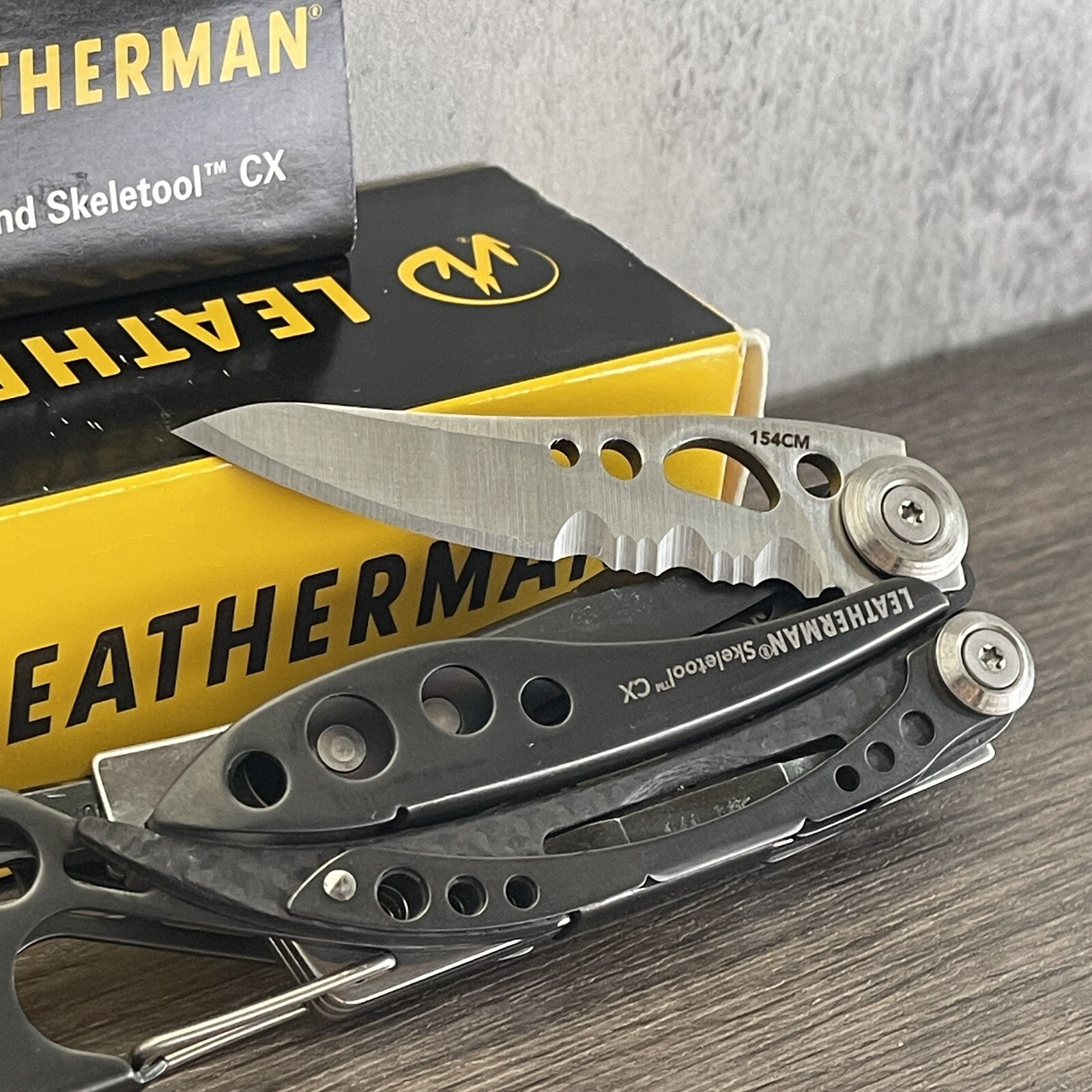 Early Leatherman Skeletool CX Carbon Fiber Handle Insert & Half-Serrated Blade