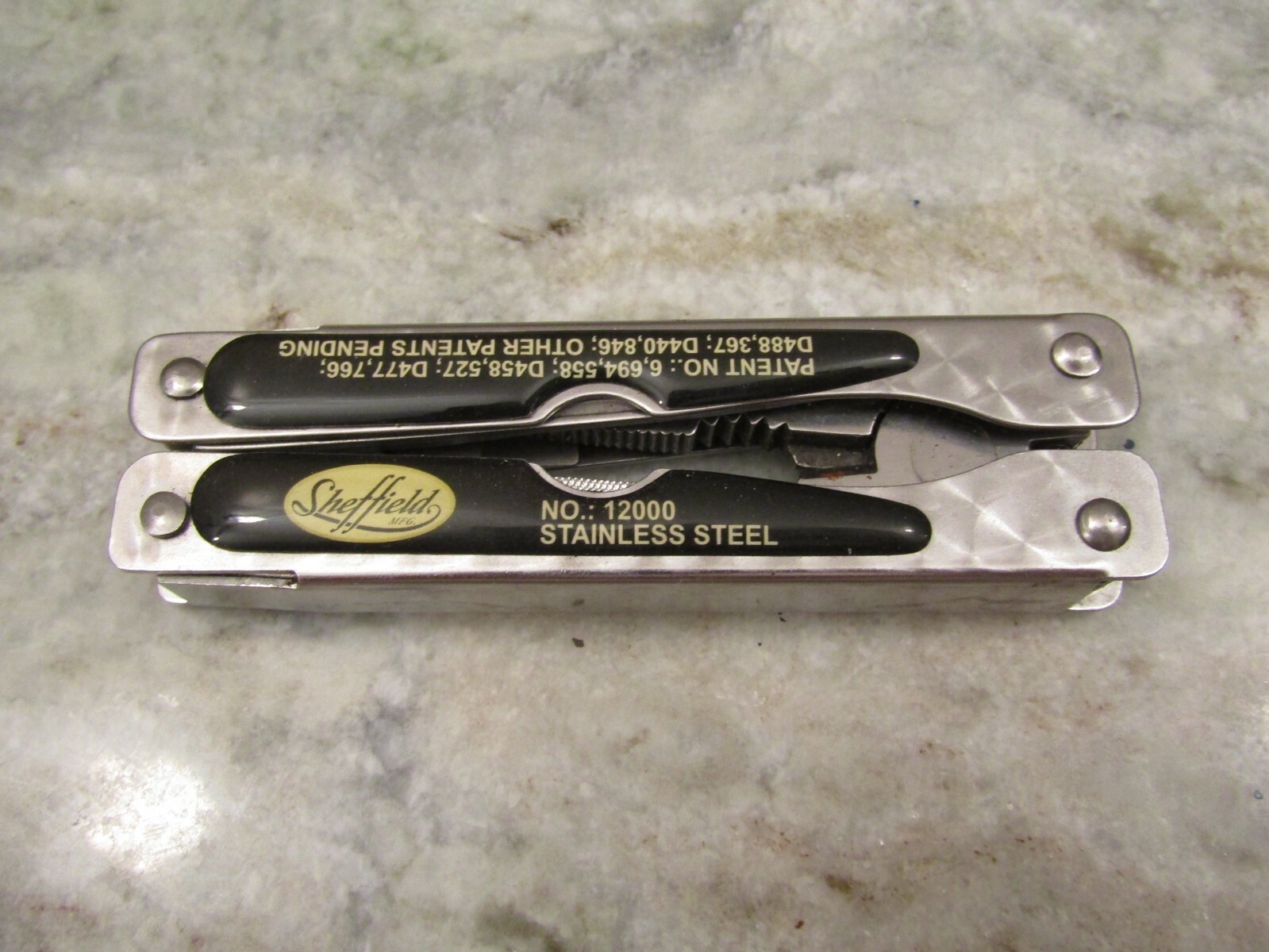 SHEFFIELD MODEL 12000 STAINLESS STEEL FOLDING MULTI-TOOL