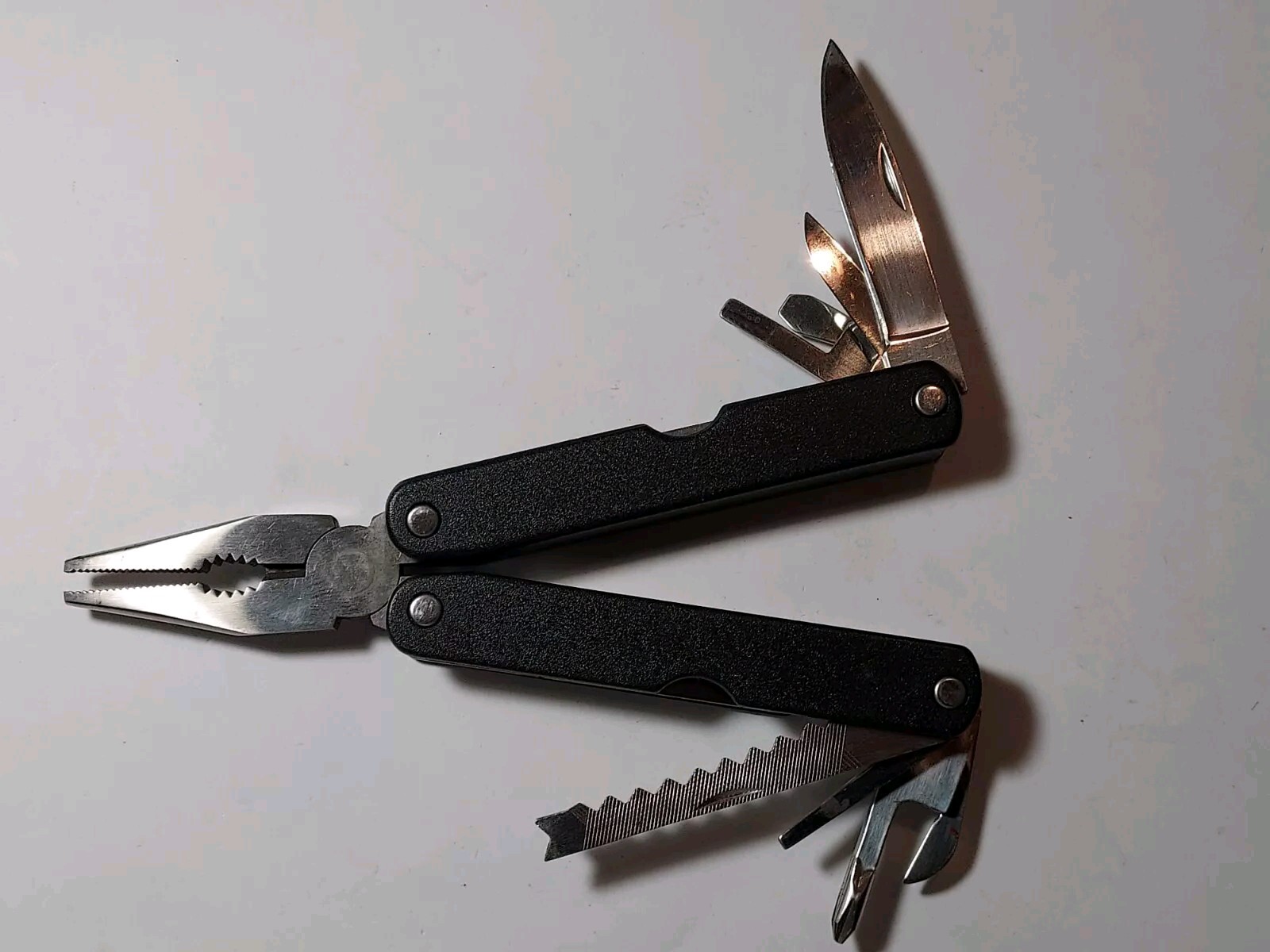 Barlow Multi Tool advertising Kleen Pig with sheath