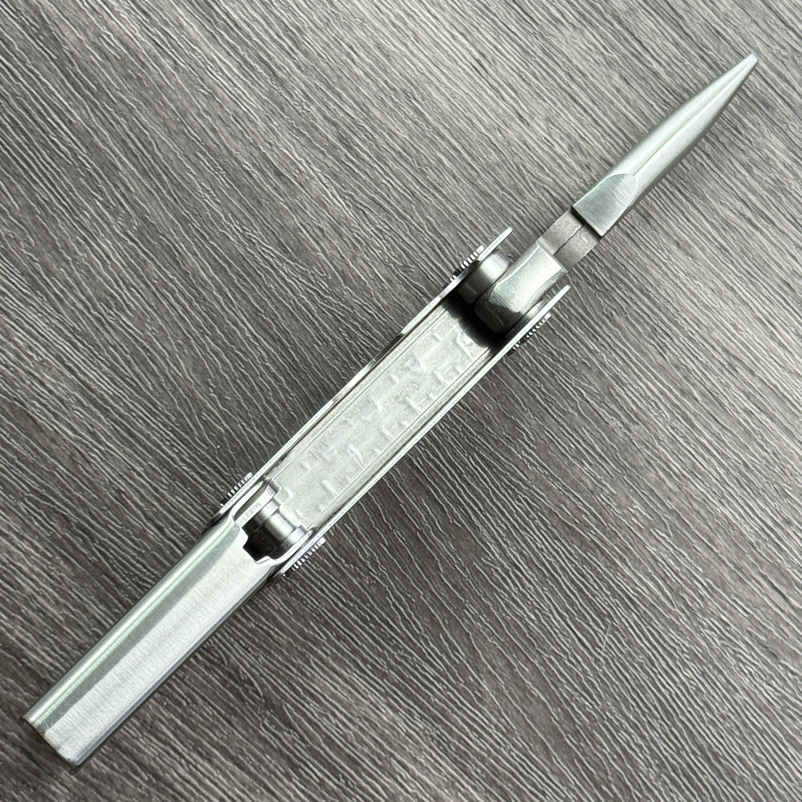 Leatherman MINI TOOL multitool. Variant w/US PAT 4744272 on Both Sides. Engraved