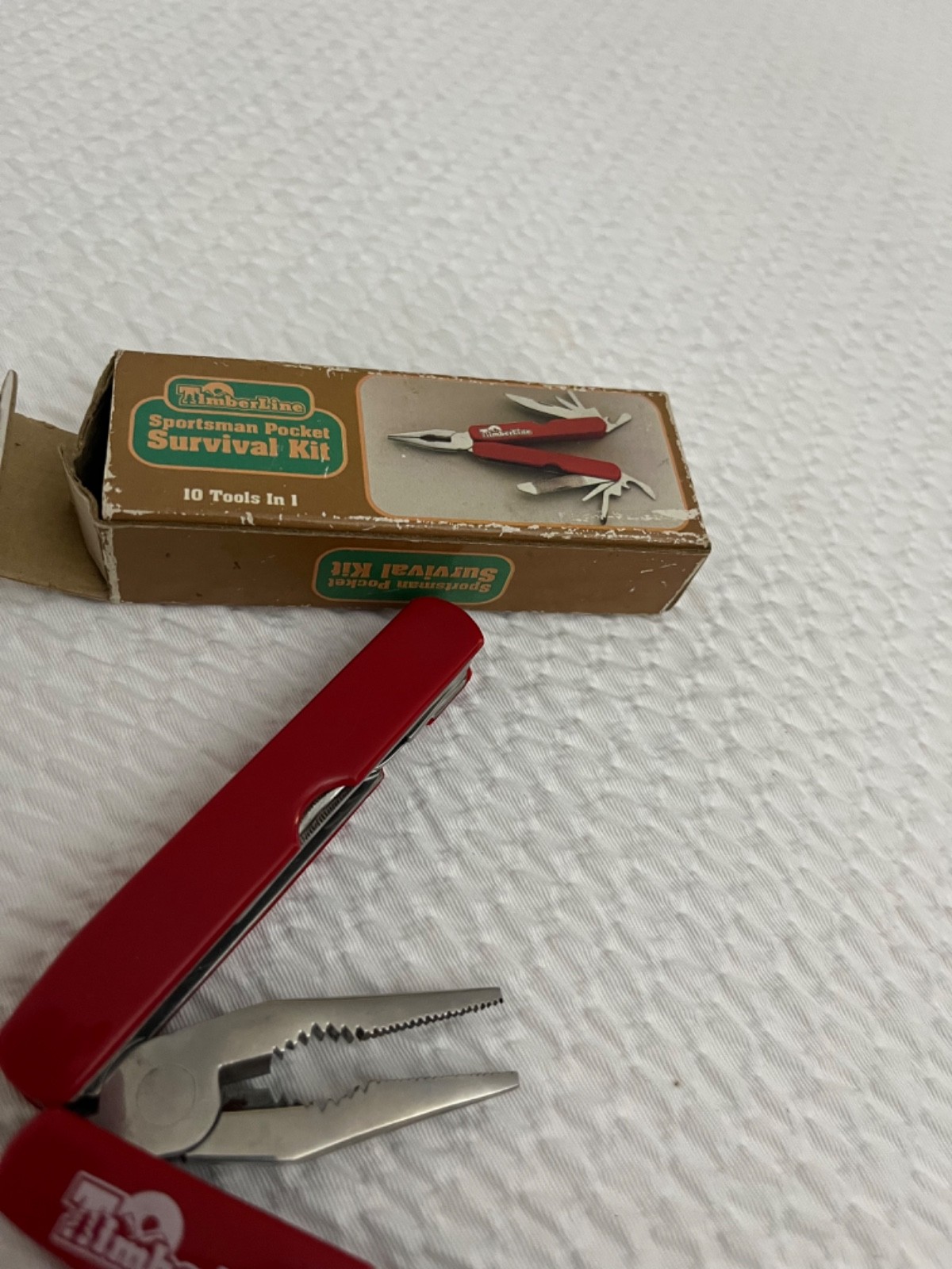 vintage Timberline Sportsman Pocket Survival Kit multi-tool in red