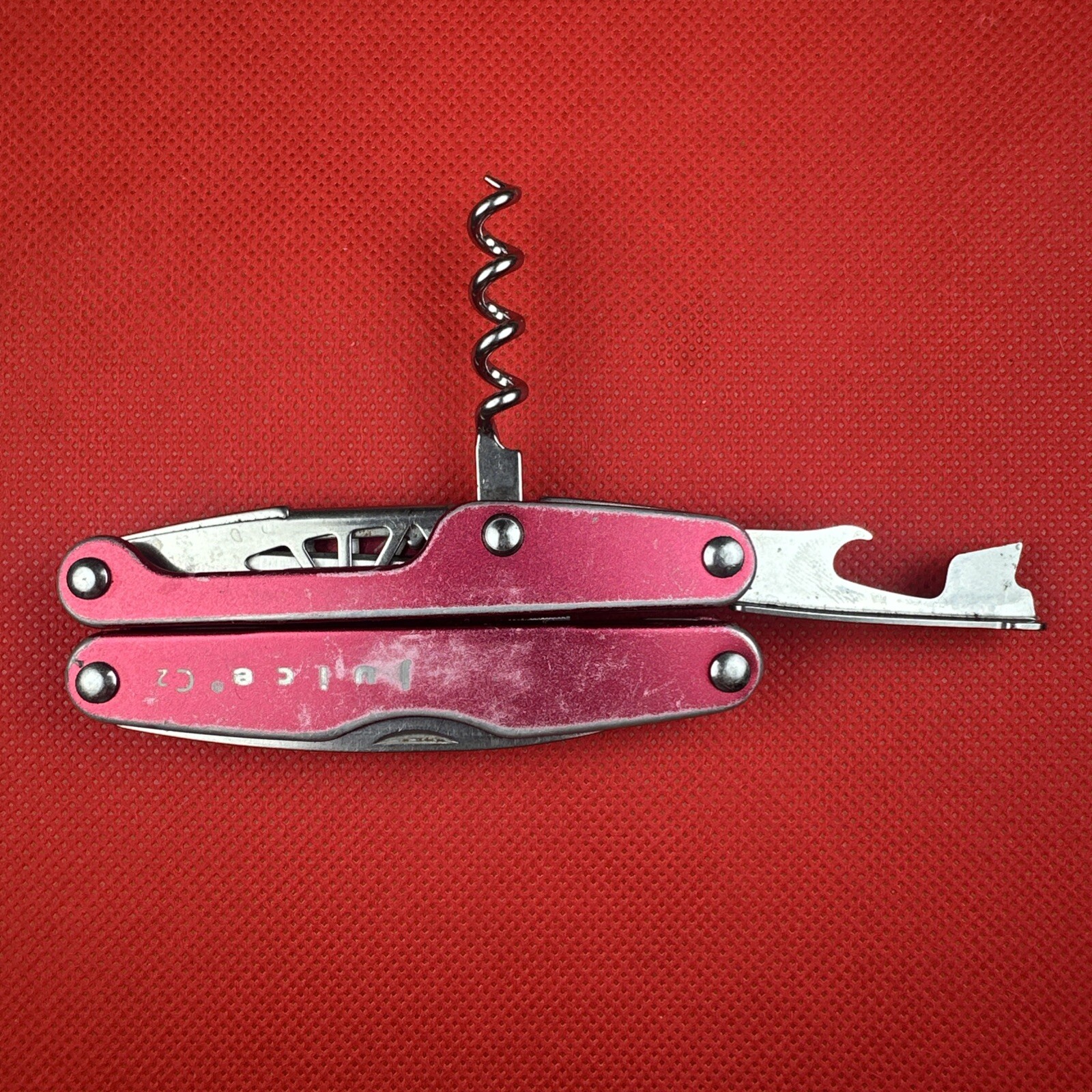 Retired Pat. Pending Gen 1 Red Leatherman Juice C2 Multitool. Great EDC!