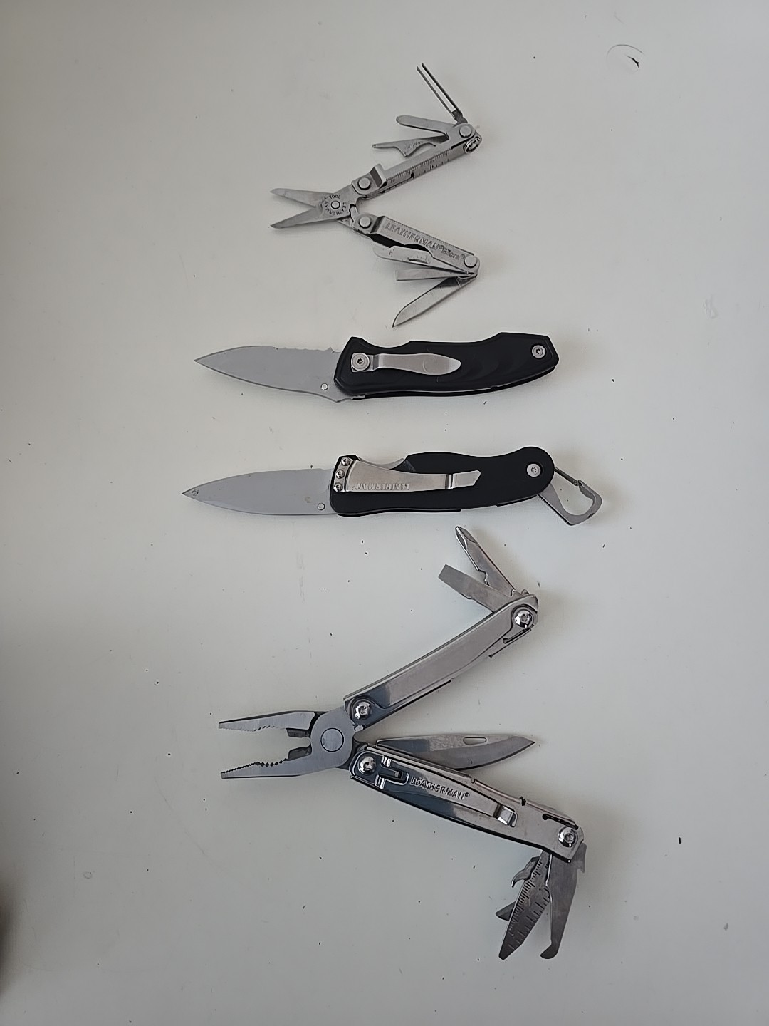Lot of 4 – Leatherman Multi-Tools – Micra, C33, C301, REV