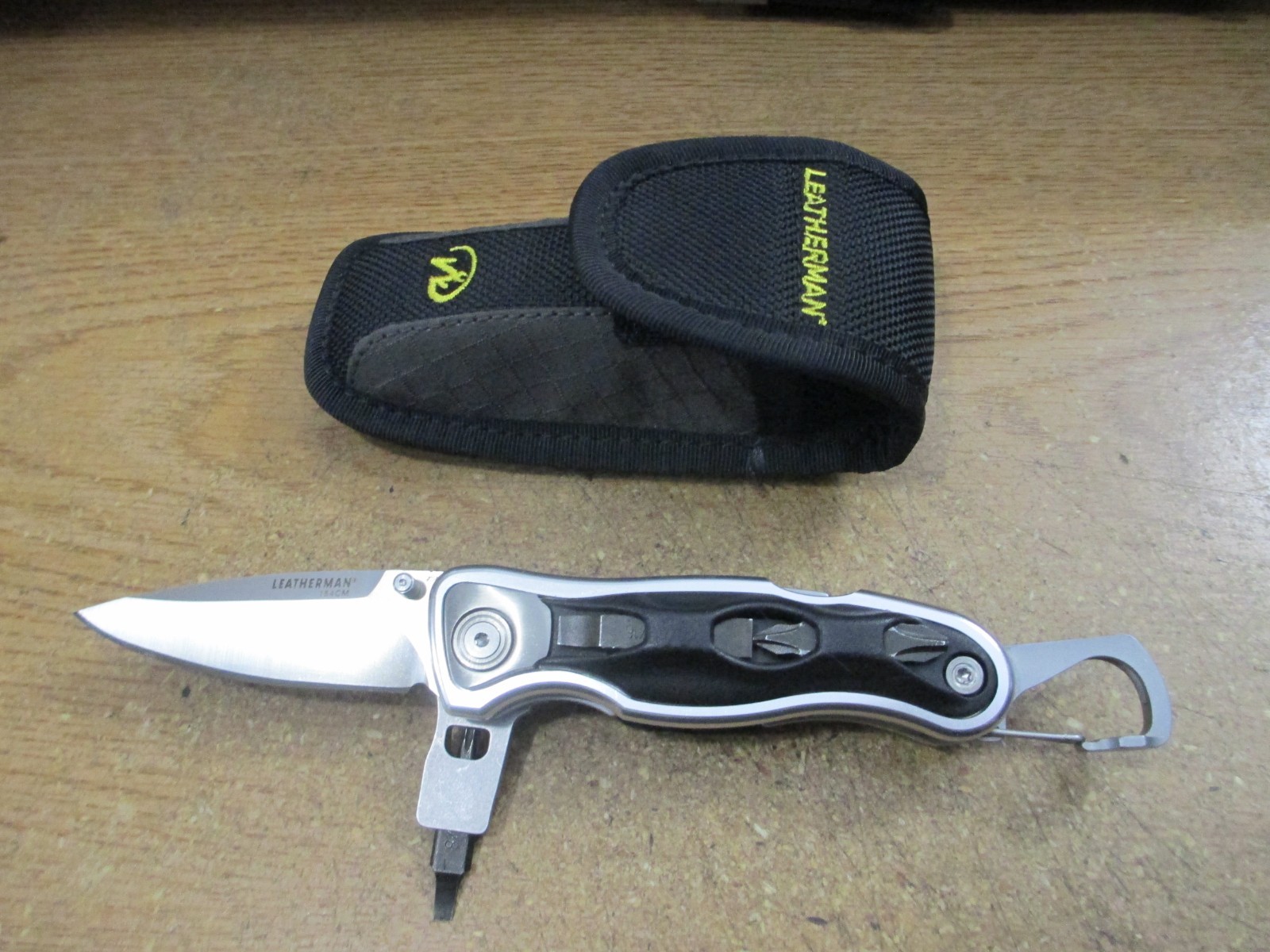 Leatherman E306x Knife Bit Holder Driver Caribiner Bottle Opener W/Sheath
