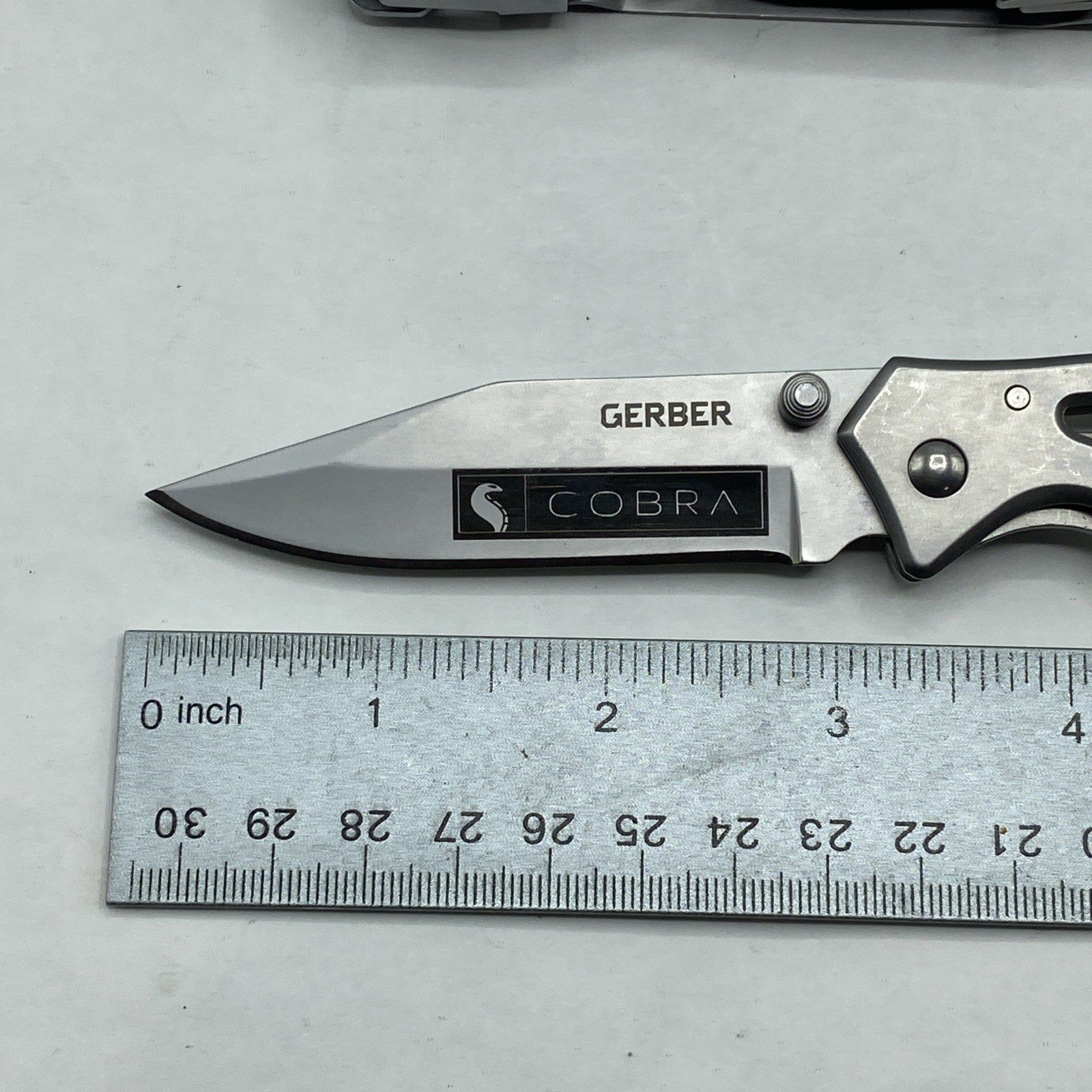 Gerber Suspension NXT & Paraframe I Knife Logo Combo – Silver