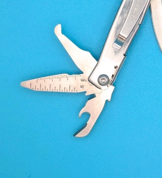 Leatherman Rev 3.8″ Multi-Tool, Stainless! With Sheath!