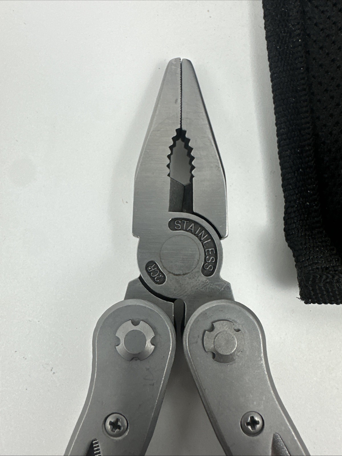 Stainless Steel Multi-Tool, 4” Long Enclosed, Heavy Duty Molded Nylon Pouch.