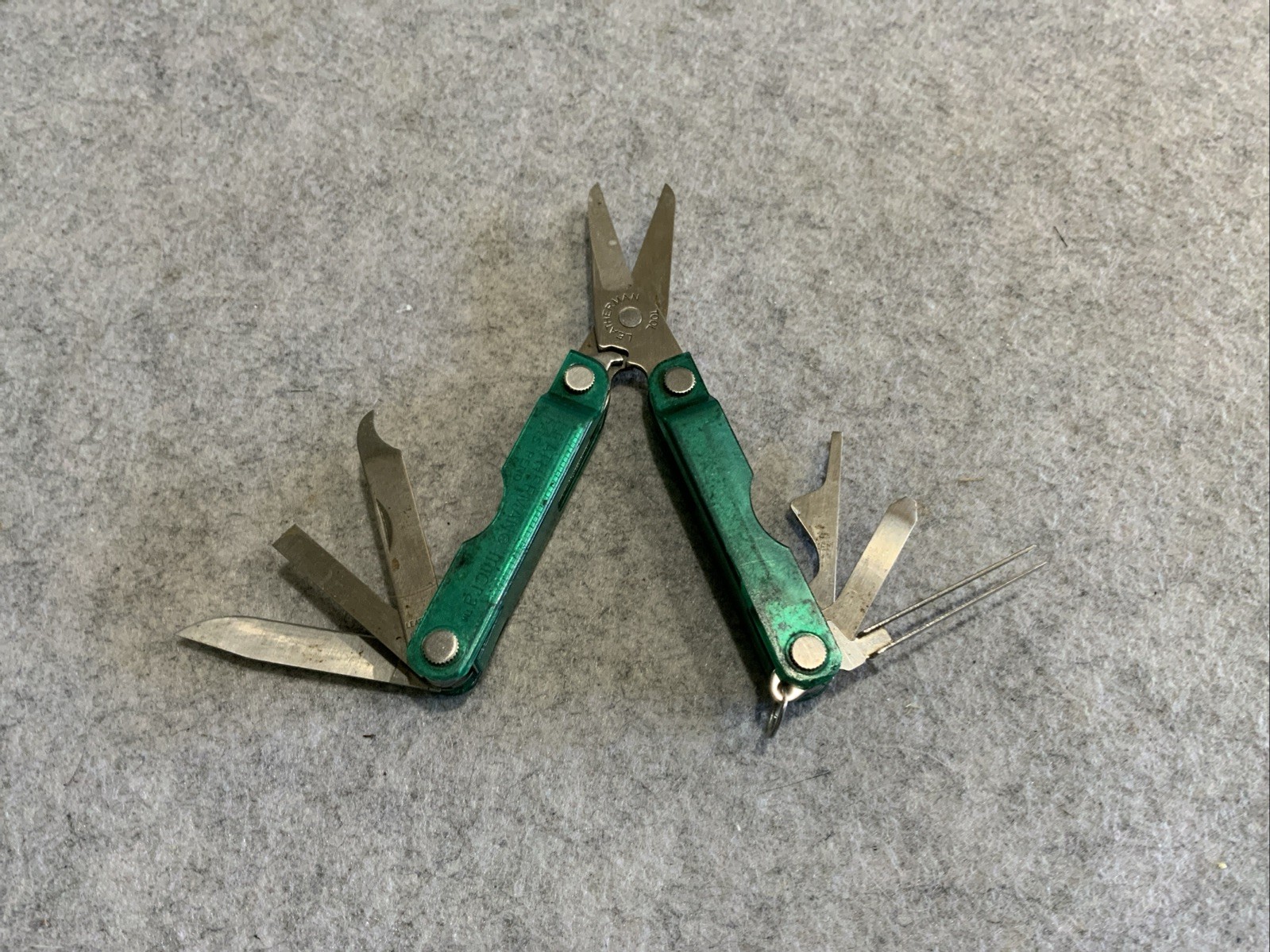 Leatherman Micra Multi Tool Green Transparent Plastic Coating Scissors Knife