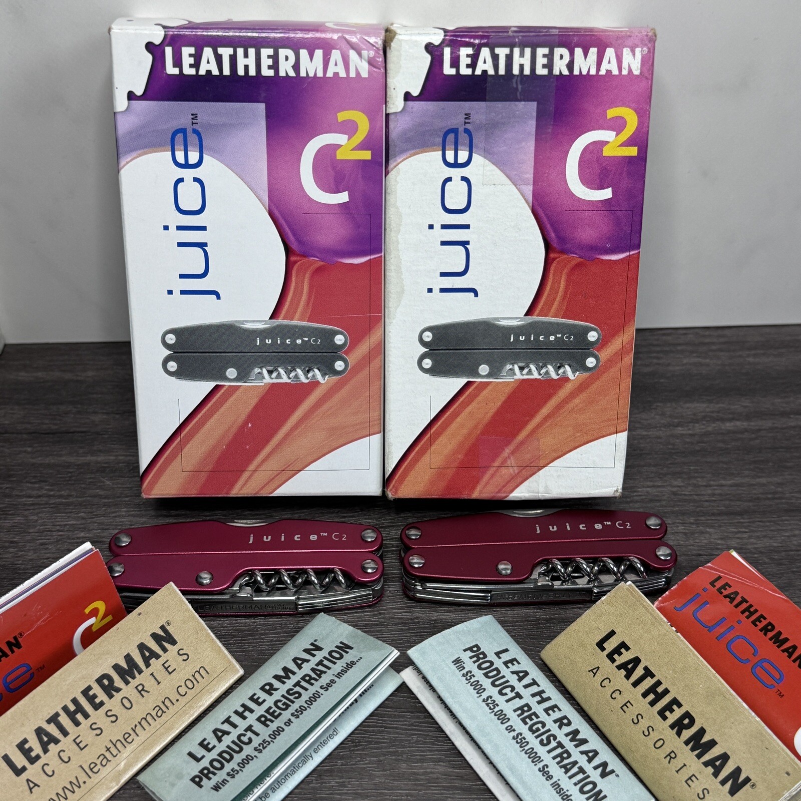 TWO Leatherman Juice C2 Red multitools. TM variants. Discontinued