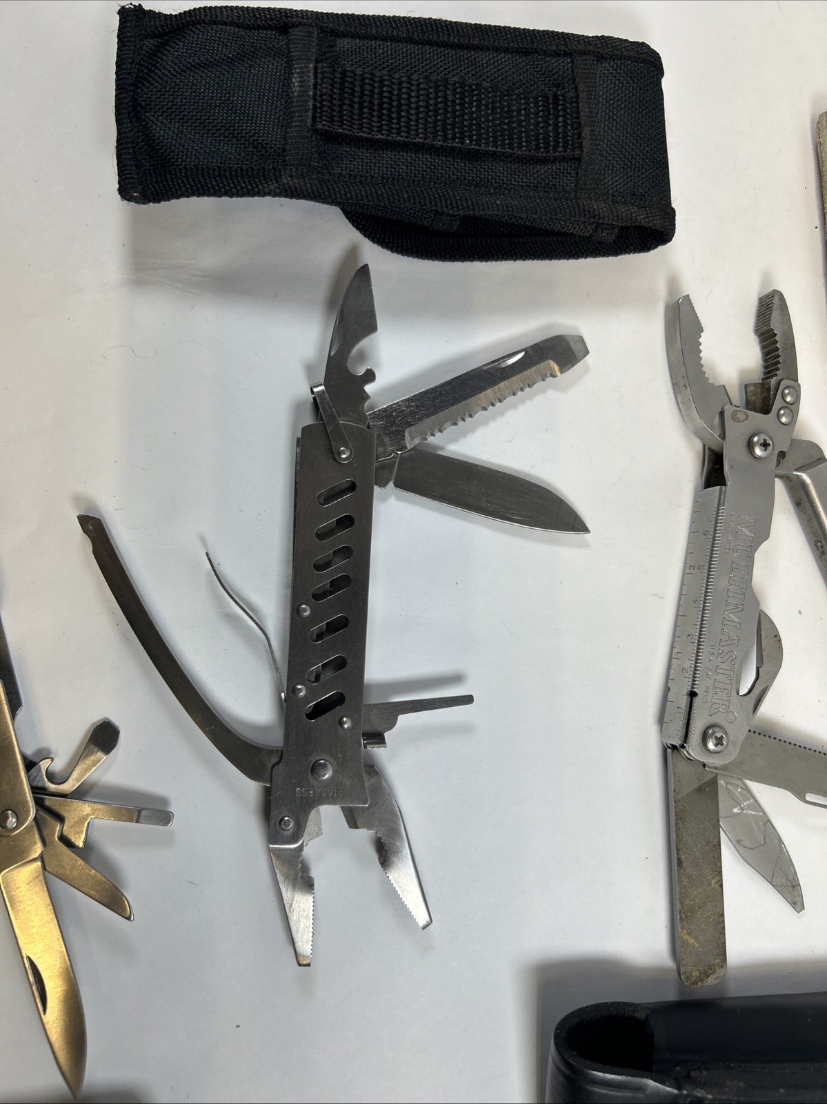 Used Lot of 3 Multi-Tool Pliers 1 MultiMaster and 2 General, Plus Sharpen Stone