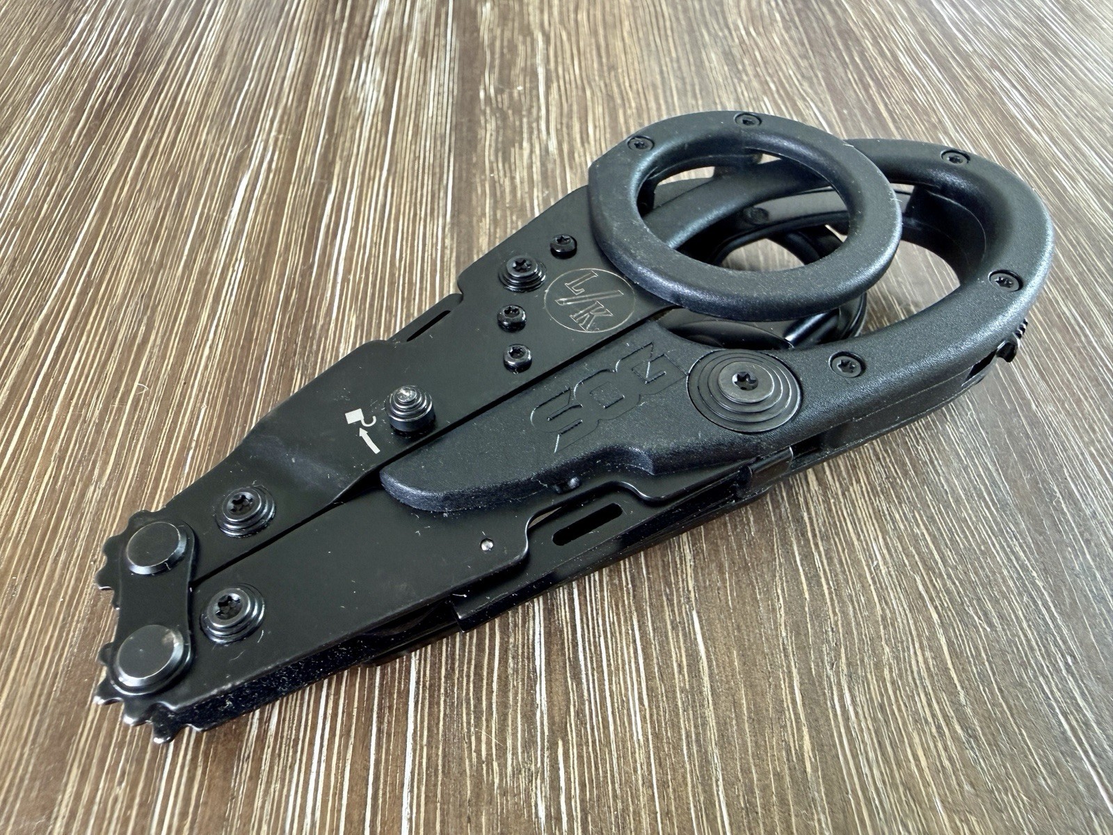 SOG ParaShears tactical emergency shears with a black oxide finish.