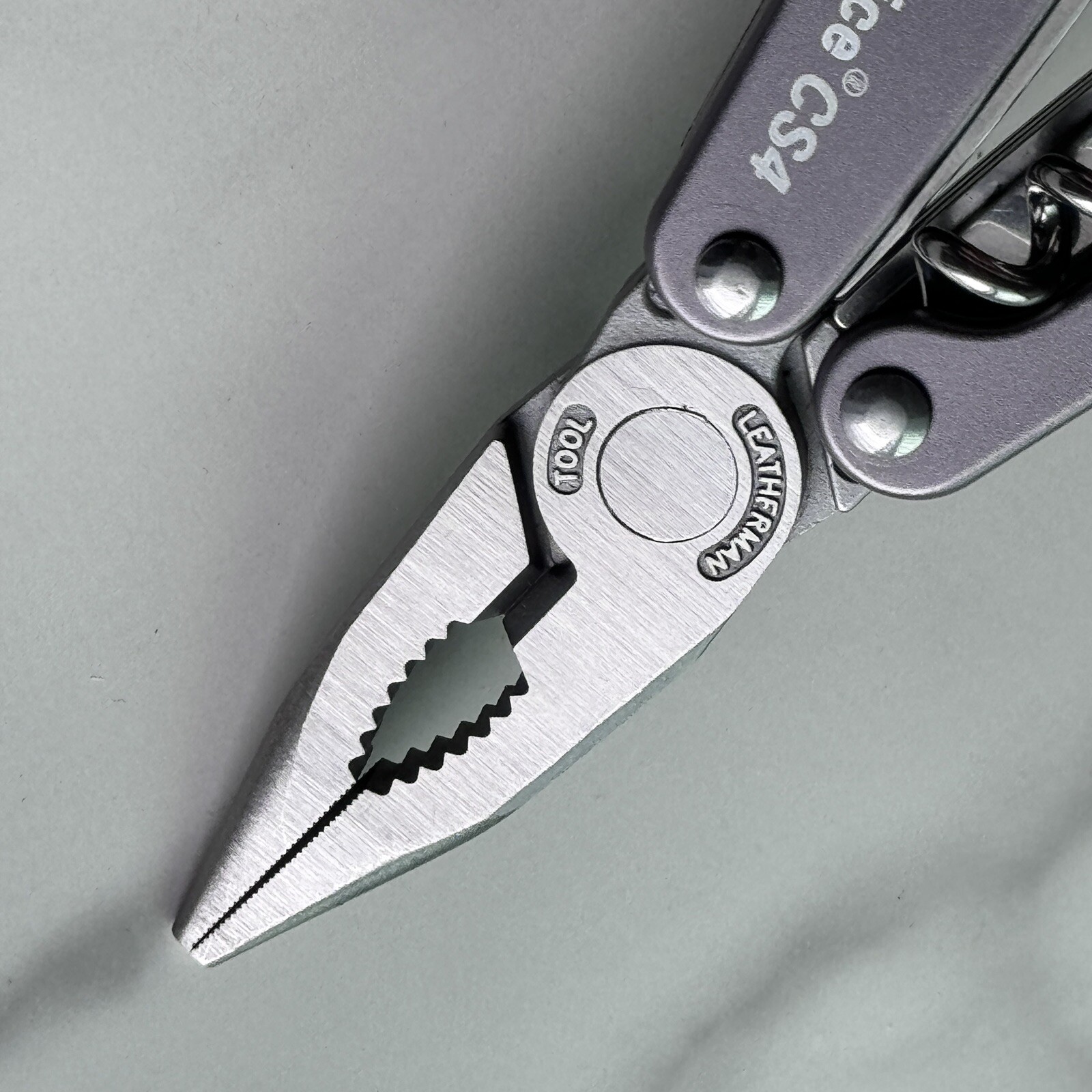 New, Early Leatherman Juice CS4 Storm Gray multitool.