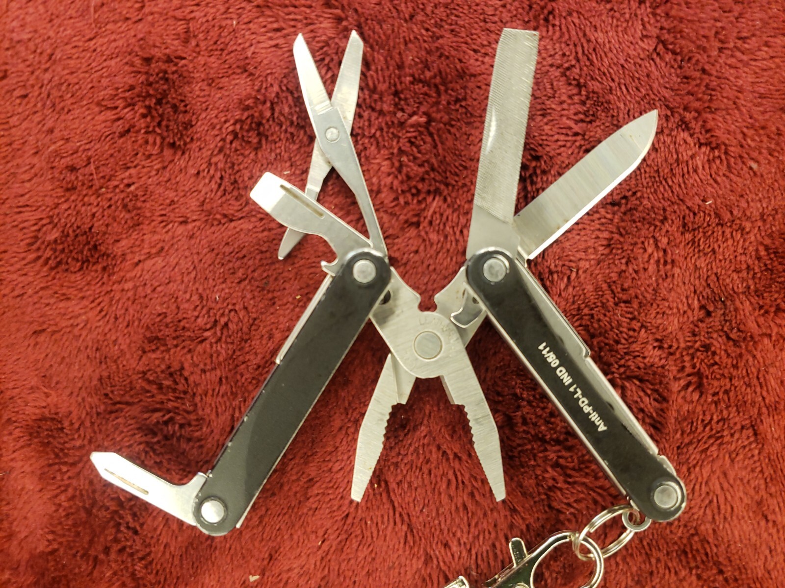 Leatherman Squirt PS4 Multi-Tool Black Keychain Anti-PD-L1 IND 05/11 print