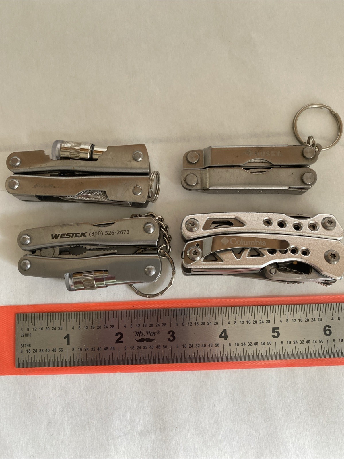 Lot of 4 Mini Multitools Columbia Eddie Bauer Husky. Flashlights Work. Hike Camp