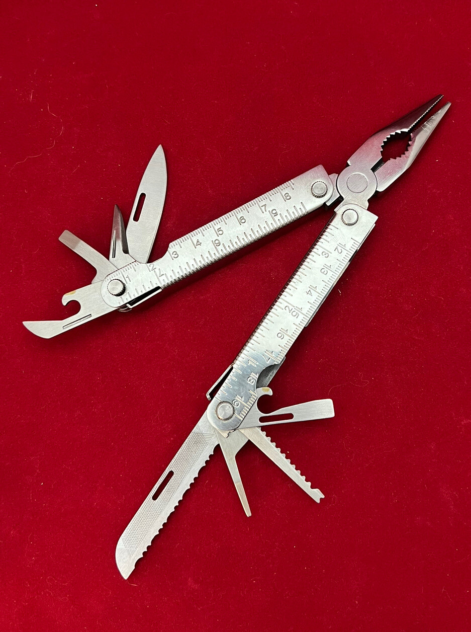 Stainless Steel 12-in-1 Multi-Tool – Pliers Knives Screwdrivers File Saw Opener
