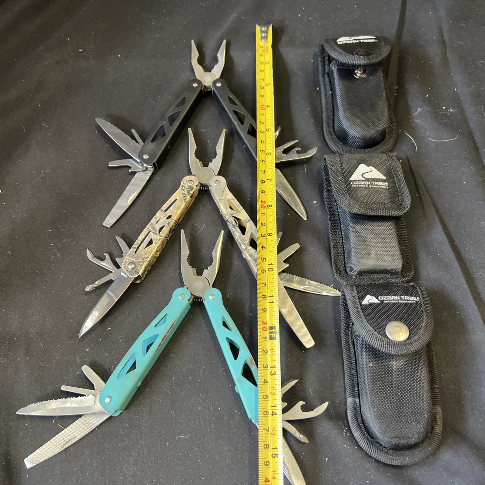 Set Of 3 Ozark Trail Trailside 12-in-1 Multitool – Black, Teal, & Camouflage