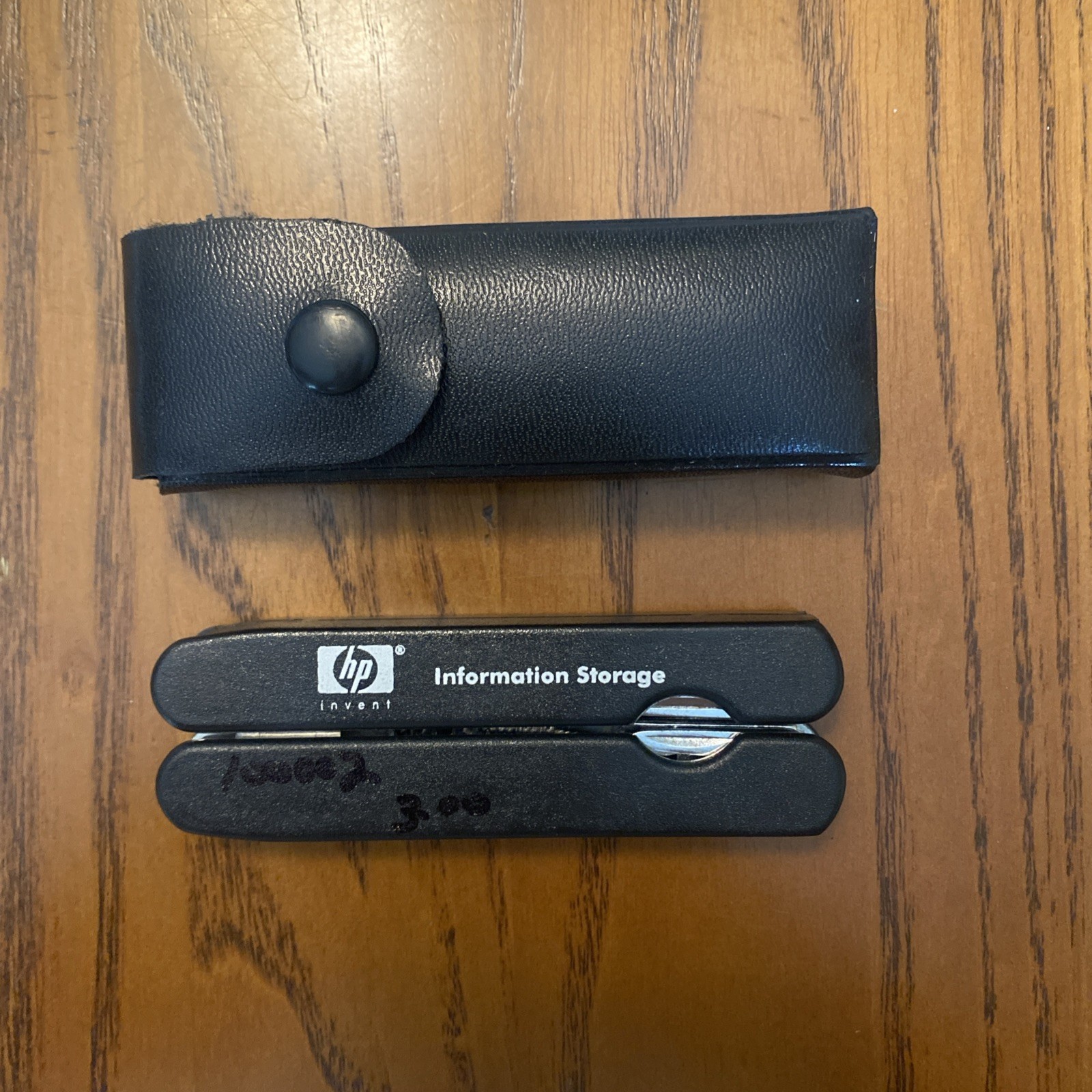 HP Black Multi Tool With 8 Attachments, Pliers, And Leather Sheath