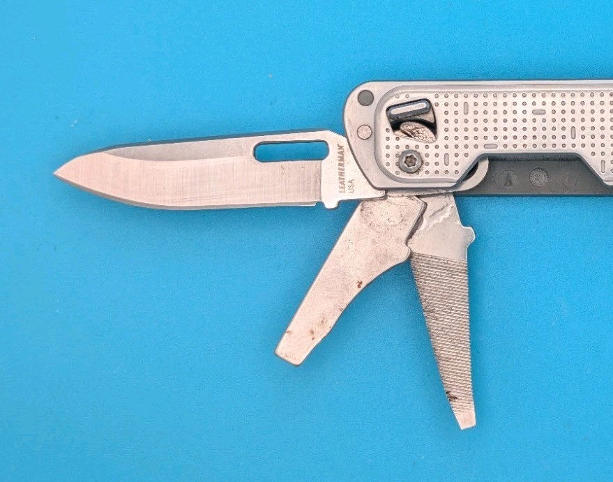 Leatherman FREE T4 Pocket Knife Multi-tool! Stainless! RETIRED!