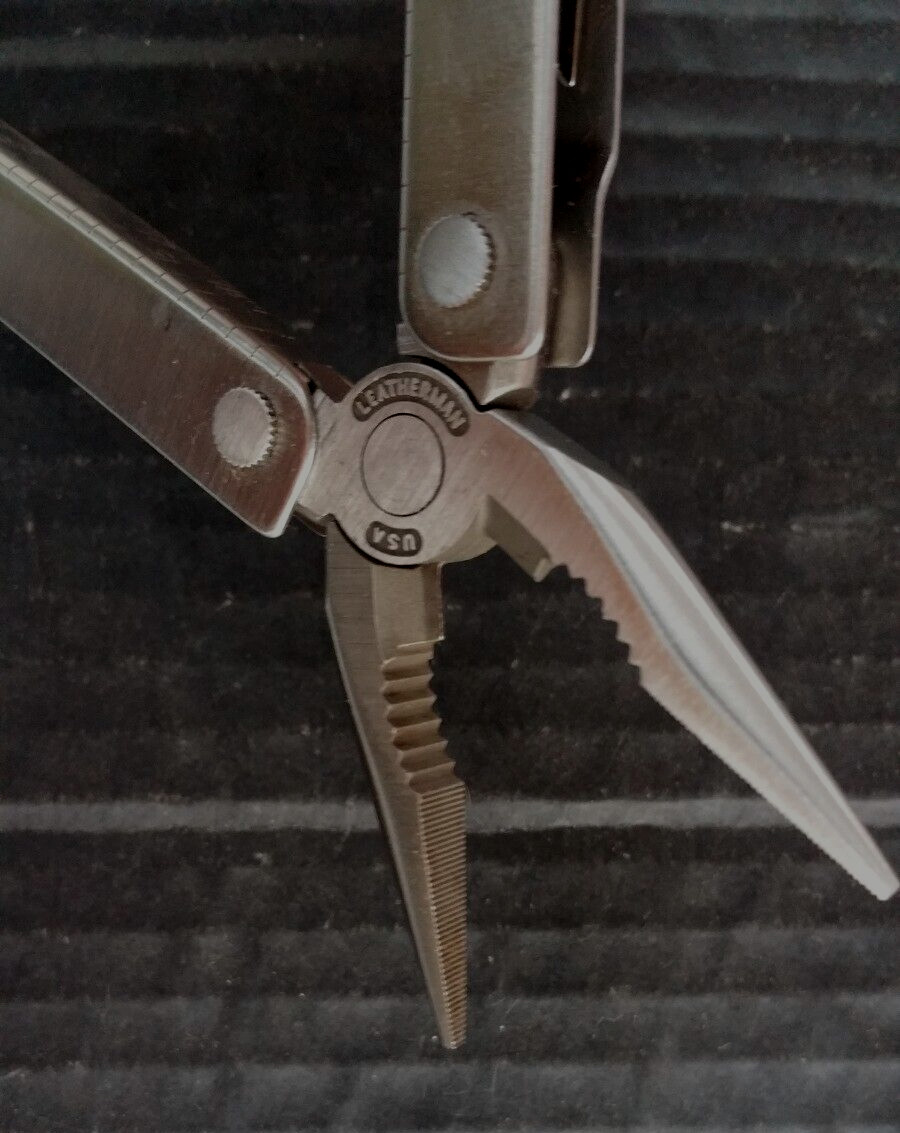 Leatherman Multi Twelve Tool Stainless 4″ No Sheath 2.5″ Blade Excellent + 1985