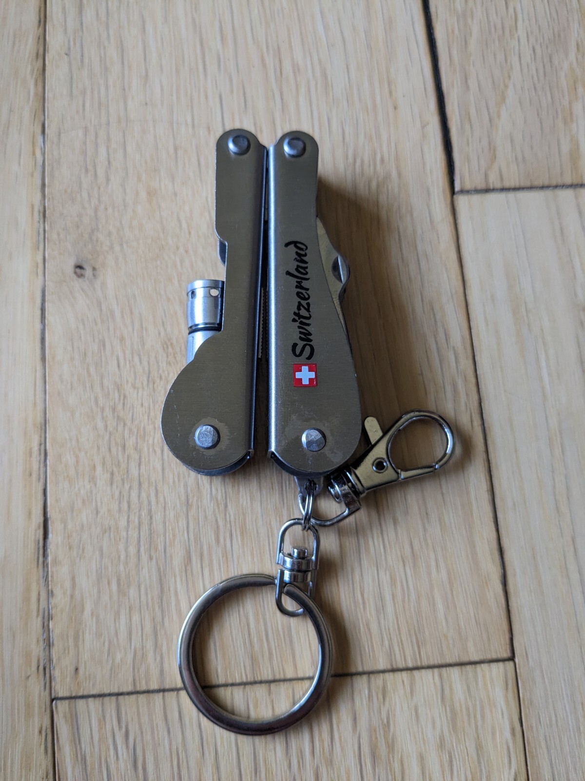 Swiss-Made Foldable Pocket Multi-Tool Stainless Steel w Pocket Clip. 8 Functions