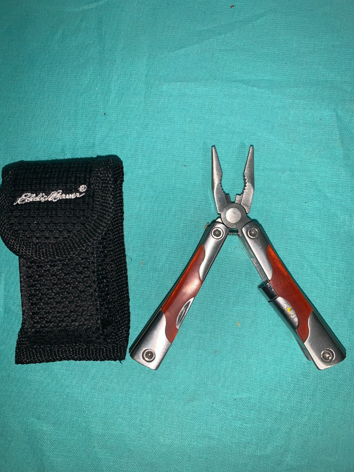 Eddie Bauer Silver &Woodgrain Multi Tool & Black Sheath Multi Bit & flashlite 2”