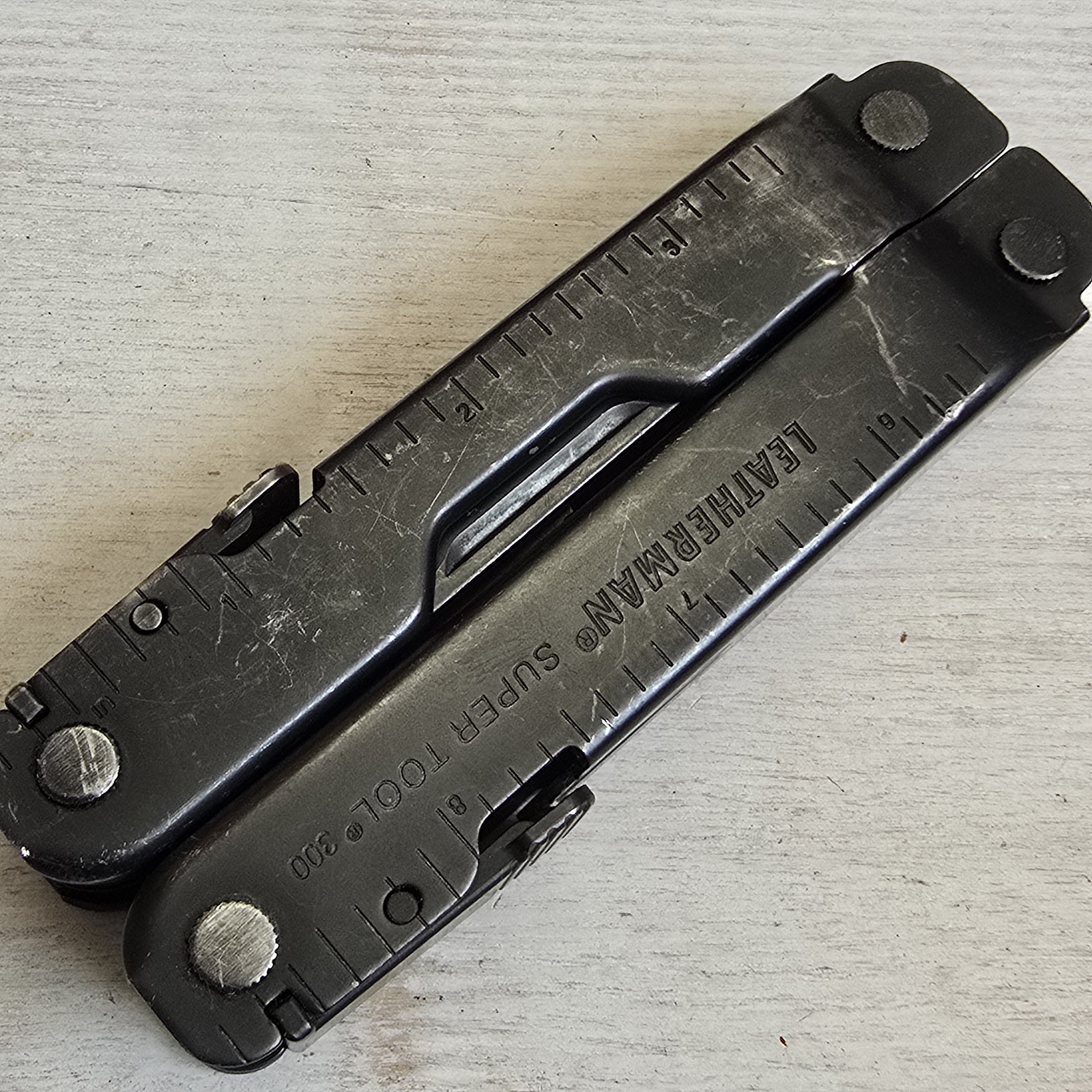 LEATHERMAN SUPER TOOL 300 MULTI TOOL PLIERS KNIFE SUPERTOOL 831106 BLACK OXIDE