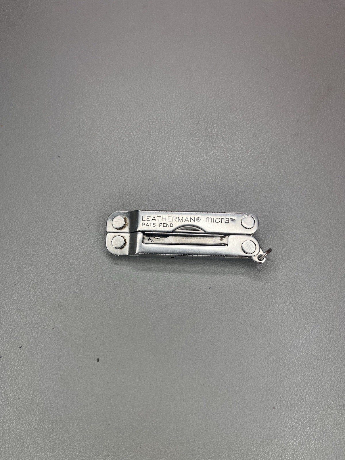Leatherman Micra keychain multi-tool with sheath. USA