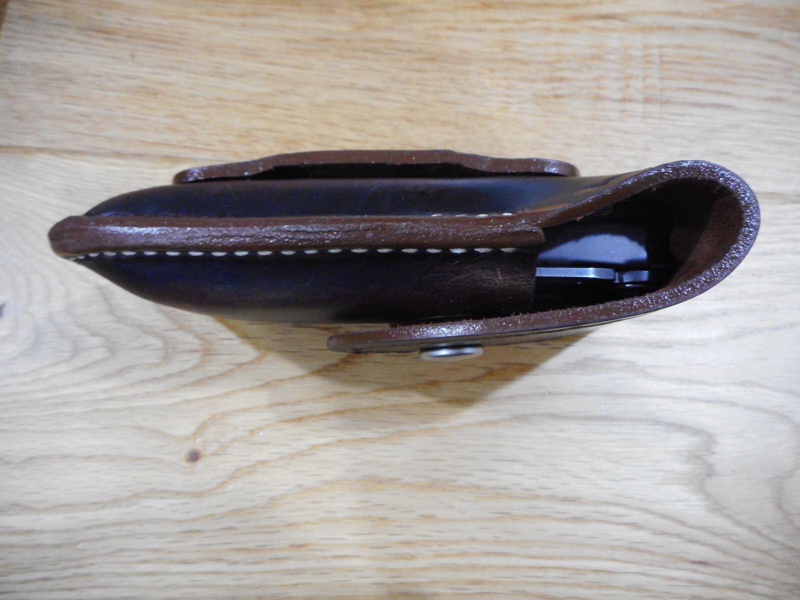 Leatherman Surge. Crazy Horse leather sheath. Tooled flap. Sheath only.