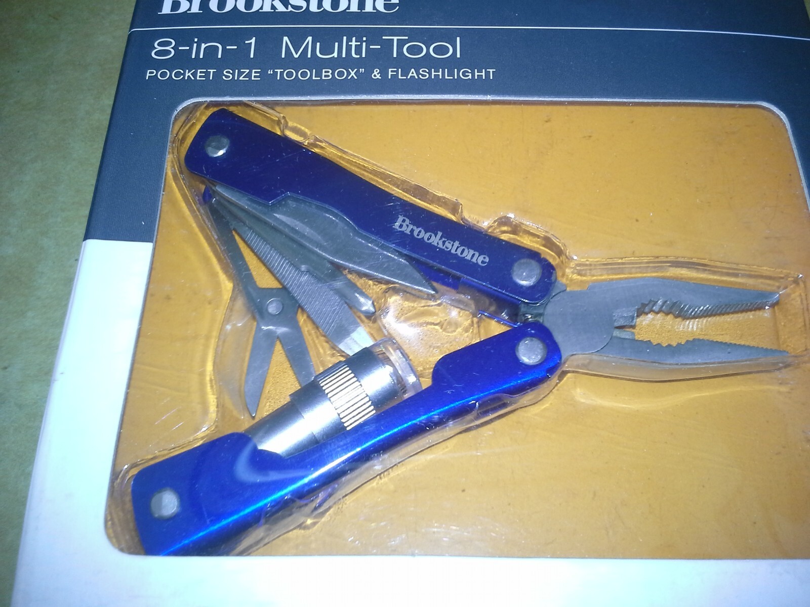 Brookstone 725704 Blue 8-in-1 multi-tool pocket size toolbox. Working. VGC