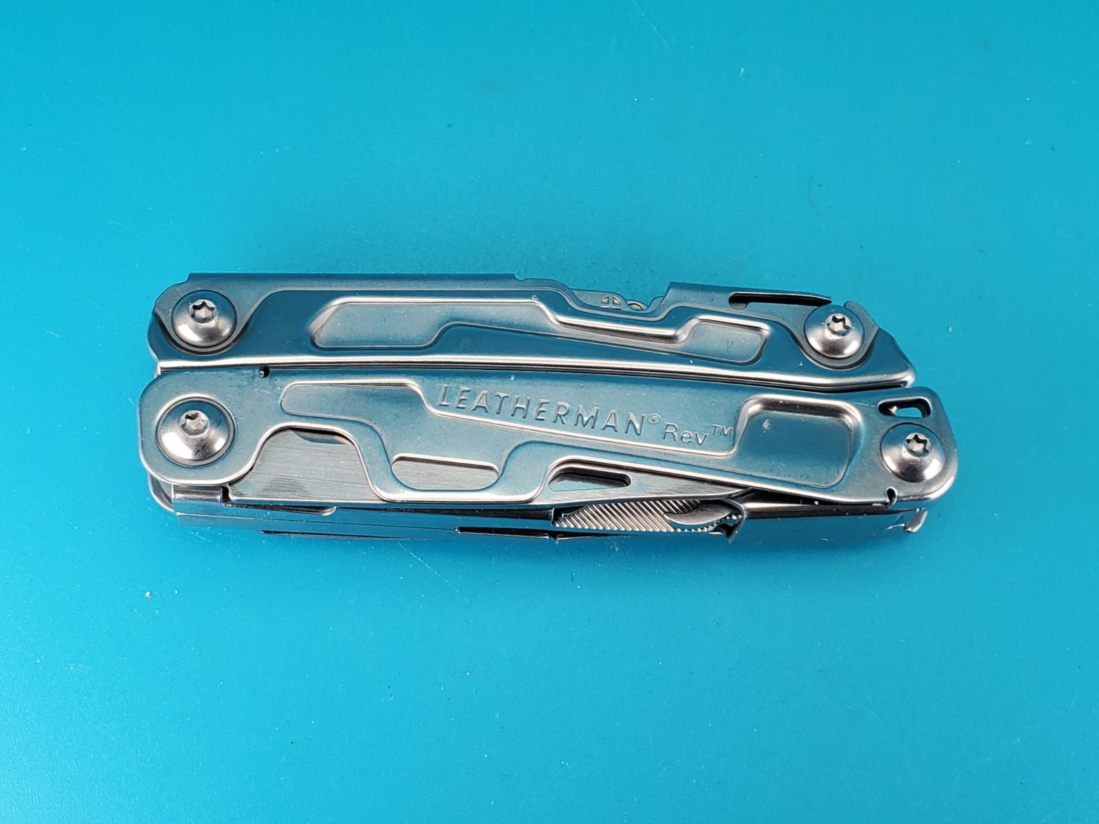 Leatherman Rev 3.8″ Multi-Tool, Stainless! *SOME RUST ON ITEM*